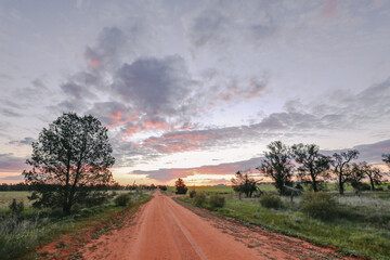 Sun setting on country road in Central Victoria, Australia. Late afternoon in Australia.