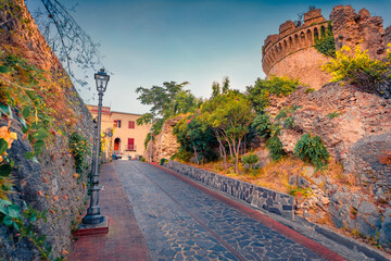 Empty street around Aragonese Belvedere Marittimo Castle. Colorful morning cityscape of Belvedere...