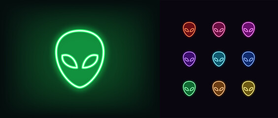 Outline neon alien icon. Glowing neon alien face, humanoid emoticon in vivid colors - obrazy, fototapety, plakaty