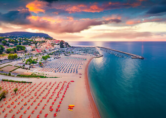 Majestic sunrise in Numana public beach. Picturesque summer seascape of Adriatic sea. Colorful...
