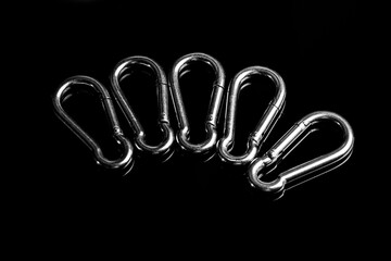 carabiners climber on black background
