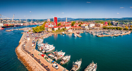 Adorable view from flying drone of Koper port. Colorful summer scene of Adriatic coastline, Slovenia, Europe. Picturesque Mediterranean seascape. Traveling concept background.. - obrazy, fototapety, plakaty