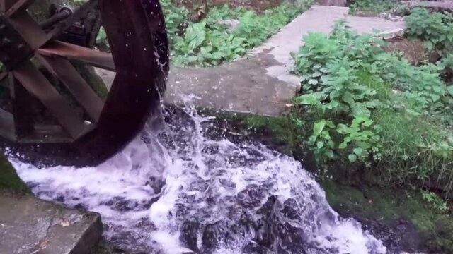 Small watermill in the park.