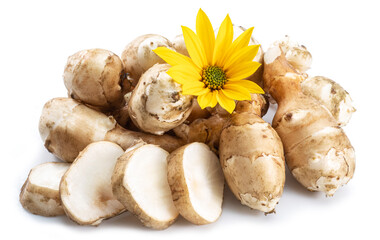 Jerusalem artichoke roots with leaves and flower of Jerusalem artichoke isolated on white background.