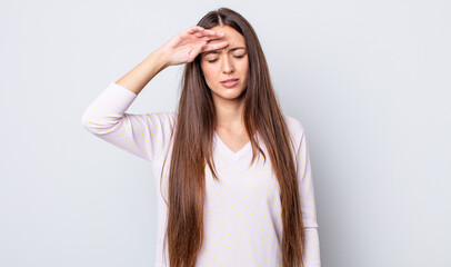 hispanic pretty woman looking stressed, tired and frustrated, drying sweat off forehead, feeling...