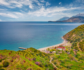 Colorful summer view from flying drone of Buneci Beach. Amazing morning seascape of Adriatic sea. Stunning outdoor scene of Albania, Europe. Beauty of nature concept background.