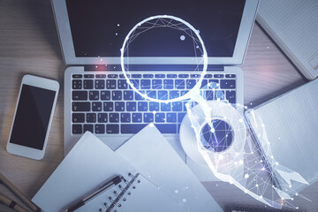 Start up theme drawing over computer on the desktop background. Top view. Double exposure. Brainstorm concept.