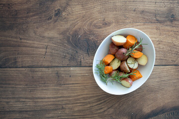 Plate of Root Vegetables on a Wooden Table
