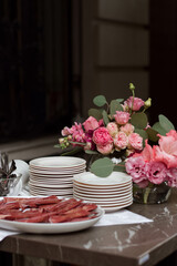 An image of a vibrant flower arrangement on an upscale bar