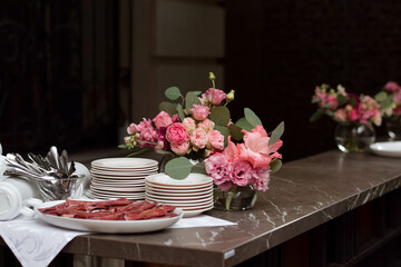 An image of a vibrant flower arrangement on an upscale bar