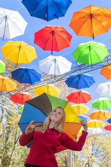 Colorful umbrellas. Bottom view. Conceptual art object. No labels or identification marks. Place...