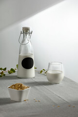 Milk on the table on a beautiful Christmas day, blank and shadow on the wall 