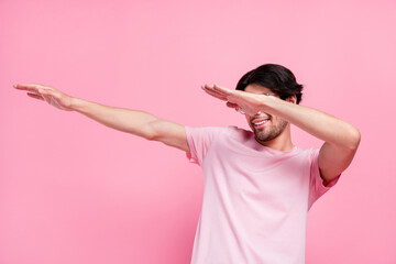 Photo portrait man wearing casual t-shirt spectacles dancing at party showing dab sign isolated...