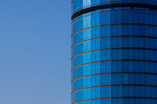 Closeup of a skyscraper with blue windows
