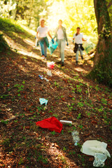 Young activists cleaning up a forest