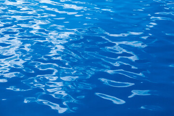 Close up blue sea surface background.