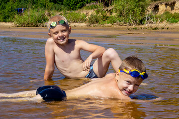 boys bathe on a sunny summer day