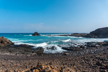 Gemstone coves on Isla de Lobos, off the north coast of Fuerteventura, Canary Islands. Spain