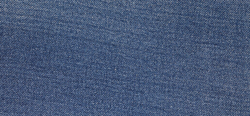 Naklejka premium Blue denim fabric background. Denim fabric Top view photo for background Copy area and text area.