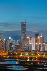 Fototapeta na wymiar Night scenery of panorama of skyline of Shenzhen city, China. Viewed from Hong Kong border