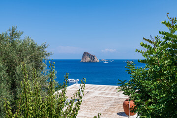 Panarea island (Aeolian archipelago), Lipari, Messina, Sicily, Italy, 08.21.2021: panoramic view  with Dattilo's rock in the background.