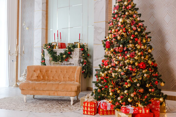 Fototapeta na wymiar large Christmas tree with red and gold balls and fireplace