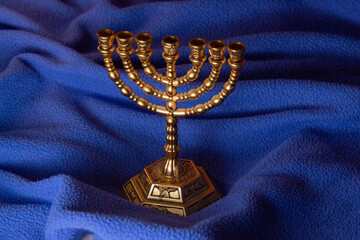 Jewish ritual golden seven-candlestick to celebrate Hanukkah, Jewish New Year and Passover