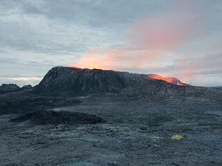 Volcano crater and hot lava fields.