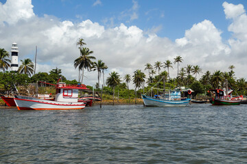 Fototapeta na wymiar colored boats on tropical river in Barreirinhas, Maranhao, Brazil