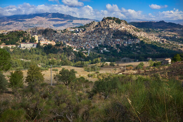 Naklejka premium the town of Nicosia in the province of Enna, in Sicily, between its countryside and its hills on a late summer day