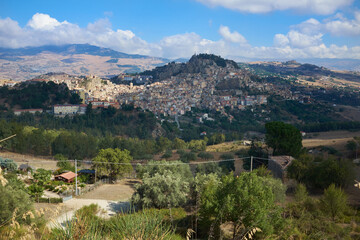 Fototapeta na wymiar the town of Nicosia in the province of Enna, in Sicily, between its countryside and its hills on a late summer day
