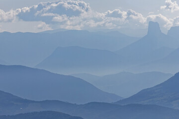 Vercors summits and hills in a foggy landscape