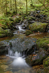 Naklejka na ściany i meble Small cascades on a creek of Belledonne mountain range, taken at low speed