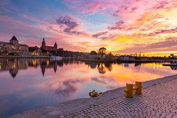 Panorama of Old town with reflection in river Oder at sunset, Szczecin, Poland - obrazy, fototapety, plakaty