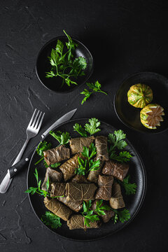 Plate with delicious sarma dish with parsley and lemon