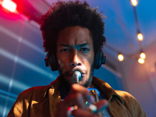 Young trumpeter performs at home