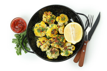 Concept of tasty food with baked cauliflower isolated on white background
