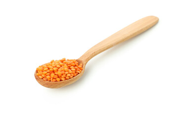 Spoon of red lentils isolated on white background