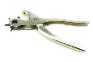 Leather hole punching tool on white