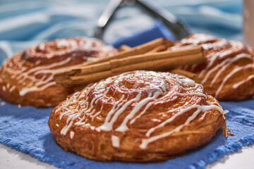 Close up of cinnamon rolls served on a marble table. Do it yourself concept.