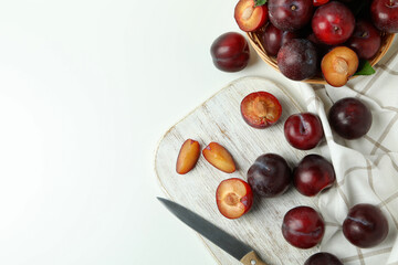Concept of fruit with plums on a white background