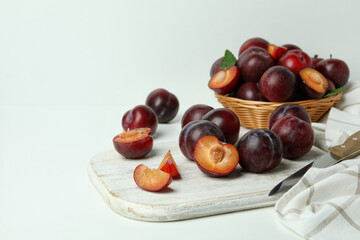 Concept of fruit with plums on white background
