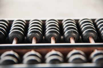 close up black and wooden abacus