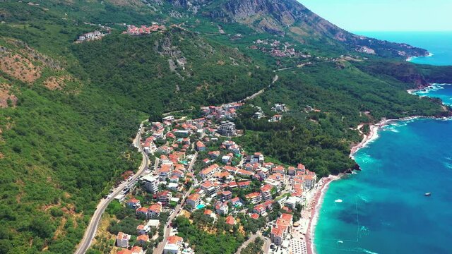 Aerial panoramic view at famous european travel destination, Budva cityscape on Adriatic Coast, Montenegro.