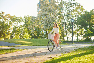 A young girl with a bike enjoying a morning