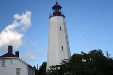 Fototapeta na wymiar lighthouse on the coast of state/Sandy Hook beach,NJ