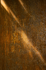 Rusty texture with rays of sunlight. Rusty texture background
