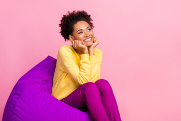 Photo of cute young brunette lady look empty space wear shirt jeans isolated on pink background