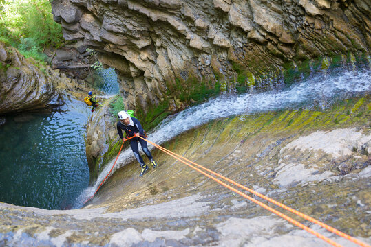 Canyoning Furco Canyon, Broto village, in Pyrenees, Spain.