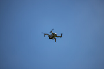 Fototapeta na wymiar Little drone flying in the air.